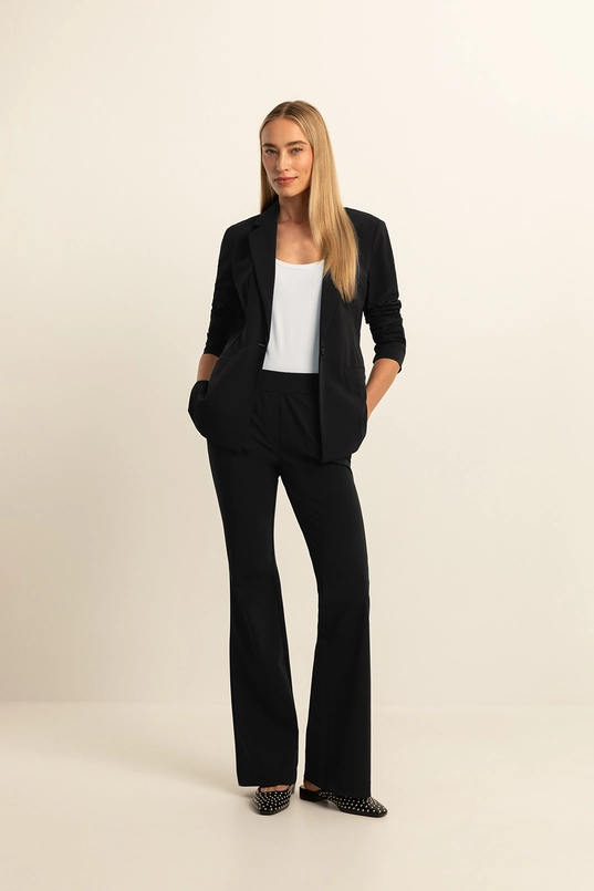 Flared broek travel stof