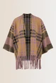 Geruite poncho